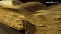 book pages yellowed, book opened half way